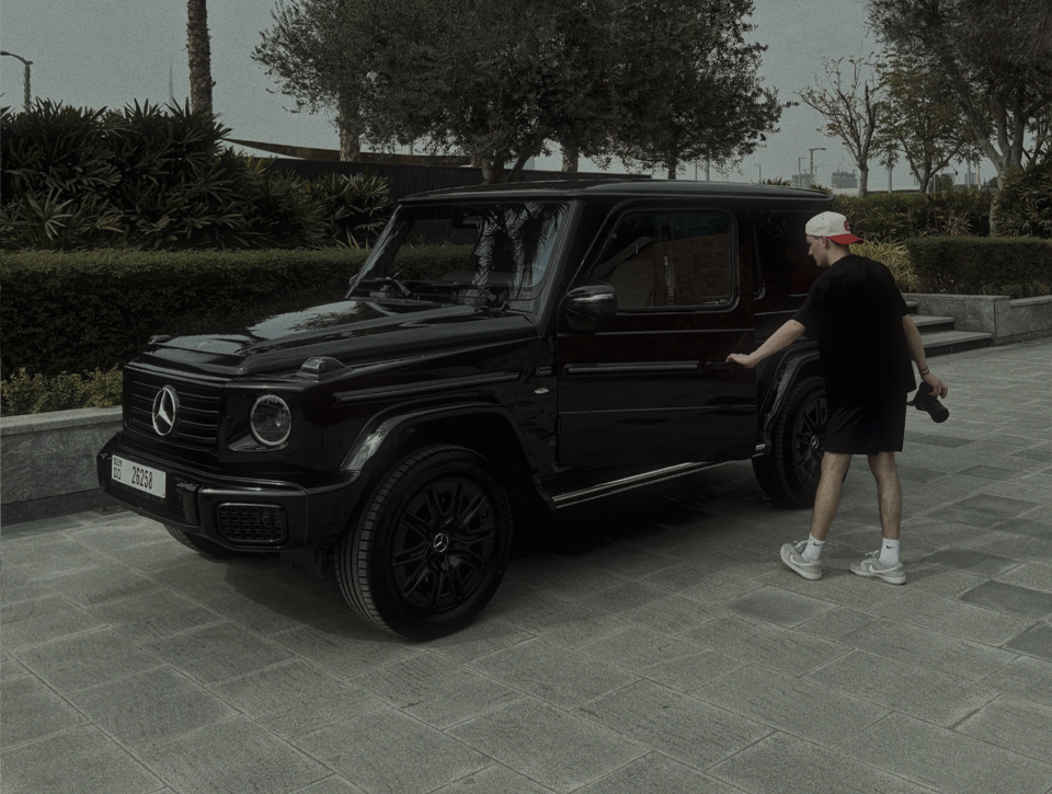 Behind the scenes — videographer with a Mercedes G-Class on a Dubai shoot